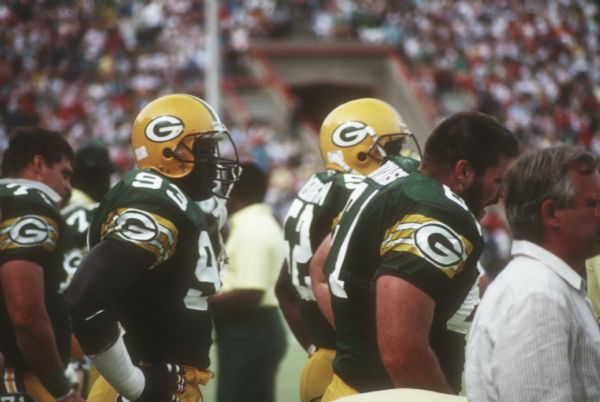 Green Bay Packers Robert Brown (#93), Mike Weddington (#52) and Jerry Boyarsky (#61) wait on the sideline during a preseason game against the Washington Redskins at Camp Randall Stadium in Madison, WI. The Packers lost 0 to 33.