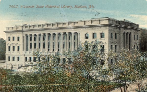 Colorized postcard of an exterior view of the State Historical Library, now the headquarters building of the Wisconsin Historical Society. The text at the top reads "Wisconsin State Historical Library, Madison, Wis."