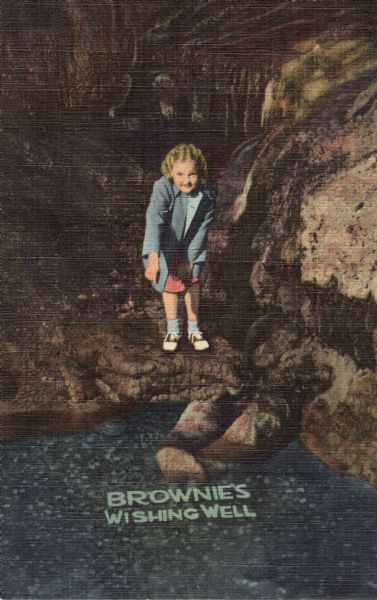 Colorized postcard of a girl throwing a penny into the Brownie's Wishing Well in the Cave of the Mounds. Caption reads: "Brownie's Wishing Well."