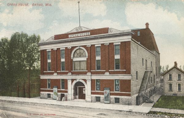 Colorized elevated view of the exterior of the opera house. Caption reads: "Opera House, Antigo, Wis."