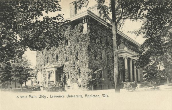 Postcard view of the ivy covered exterior of Main Building on the Lawrence University campus. Caption reads: "Main Bldg, Lawrence University, Appleton, Wis."