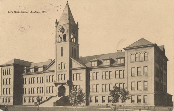 Exterior of the front facade of City High School with bell tower.