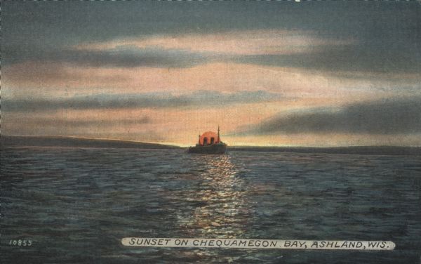 Sunset view of a steamer on Chequamegon Bay.