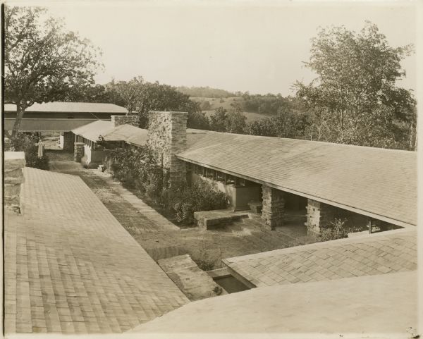 Taliesin I loggia, studio, apartment, and hayloft as seen from where the porte-cochere meets the roof of the residence.