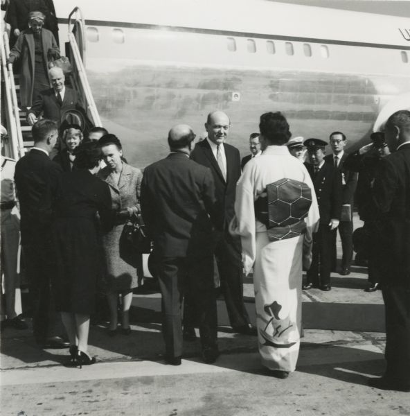 Secretary of State Dean Rusk being greeted at the Tokyo airport during a goodwill tour.