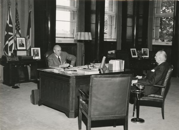 John J. McCoy, U.S. Commissioner in Germany being interviewed by Mutual news analyst Cecil Brown. Brown made his reputation during the post-World War II years with his interviews of world leaders.