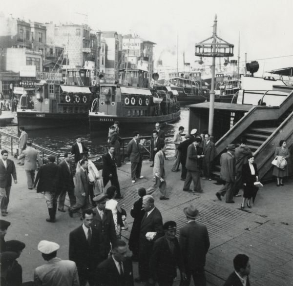 Elevated view of pedestrians at the harbor at Istanbul, Turkey.