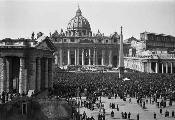 Journalist Cecil Brown, who was reporting for CBS from Rome, Italy, took this picture of the crowds in St. Peter's Square at the Vatican awaiting the coronation of Pope Pius XII.