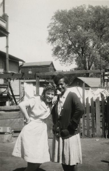 Helen Berry (left) poses with Mamie Arms, mother of Lewis Arms.
