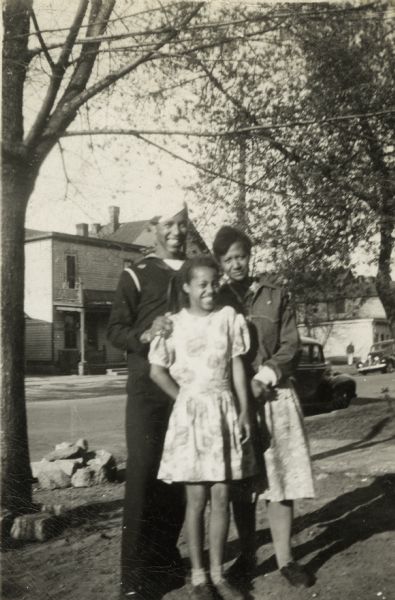 Lewis Arms, who is wearing his Navy uniform, poses with his mother Mamie (Arms) Hall, and his sister, Nedra Arms.