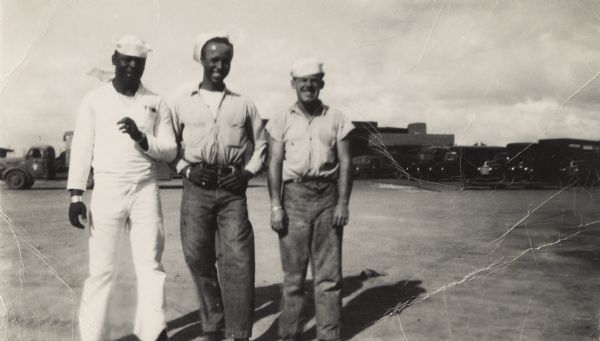 Lewis Arms (center) poses with two navy buddies at Barbers Point Naval Air Station near Pearl Harbor.