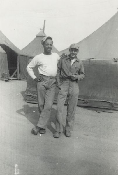 Lewis Arms (left) poses with Fred Sitting, "a couple of tired, but still smiling Marines".