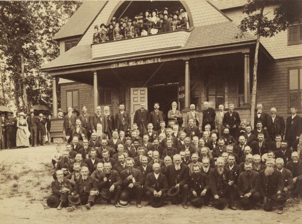 Outdoor group portrait of the reunion of the 21st Wisconsin Infantry at the Soldier's Home.