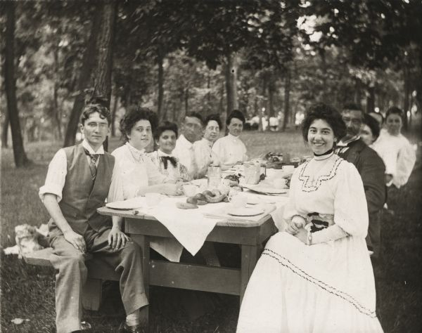 A Goldenberger Family picnic in the Madison area. The woman on the far right is Olivia Goldenberger, who performed on the operatic stage as Olivia Monona. On the far left is her first husband C.N. Johnson.