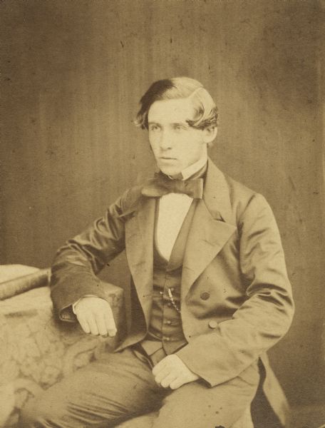 Studio portrait of John Johnston (1836-1904) as a young man. John was born in Aberdeenshire, Scotland. He came to Milwaukee, Wisconsin in 1856 and became a successful banker.