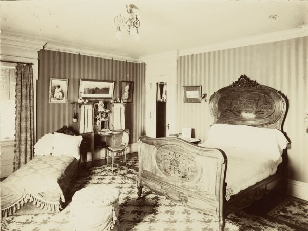 Bedroom in the home of John Johnston (1836-1904), a successful Milwaukee banker, located at 645 Franklin Place, also known as "The Lion House."  

The home was built in 1851 for Edward Diedrichs. Johnston purchased it from its third owner in 1896. The second floor with the bedrooms was added at that time.