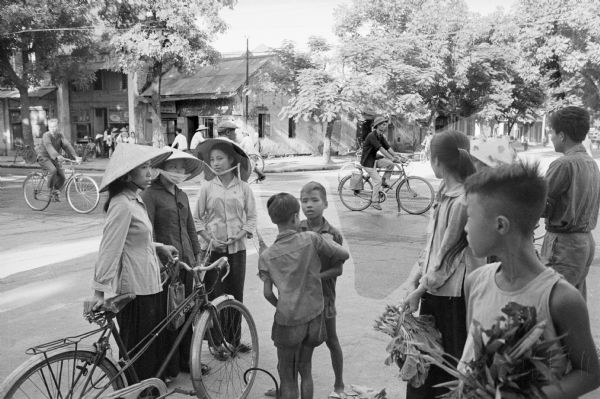 Street scene of children and adults in Phat Diem, a city about 100 miles south of Hanoi.