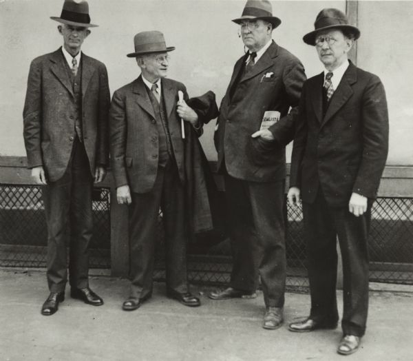 Milwaukee Socialist editors at the Brisbane Hall. Left to right: Heinrich, Frederic Heath, Emil Seidel, John M. Work.