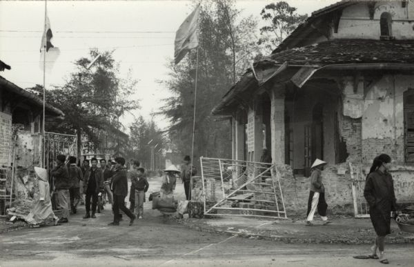 Refugees at a Red Cross aid station in Hue shortly after the Tet offensive left much of the city in ruins. This scene was witnessed by American journalist Robert Shaplen.