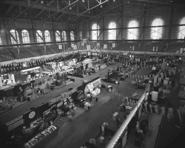 Elevated view of the Wisconsin Centennial Industrial Exposition held in the University of Wisconsin-Madison Field House.
