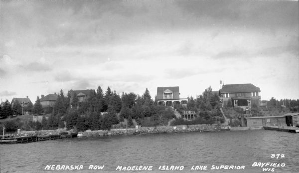 View from lake of the summer homes on Nebraska Row along the shoreline of Lake Superior.