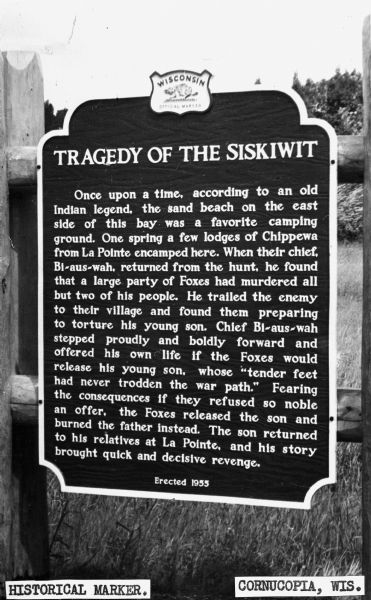Historical marker describing an Ojibwe legend that took place on Siskiwit Lake.