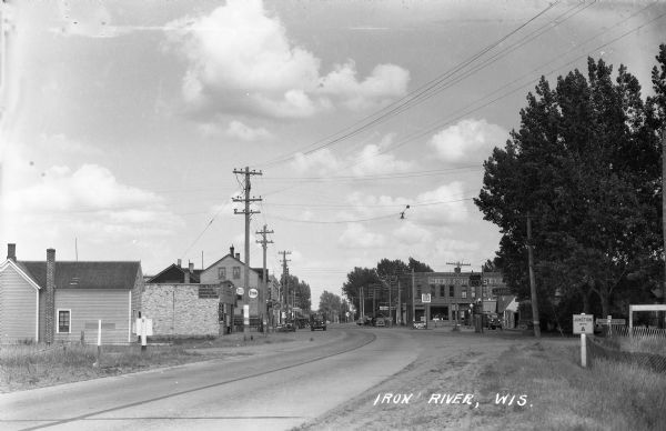 Highway through Iron River on what is now Highway 2 near the junction with County Highway A.