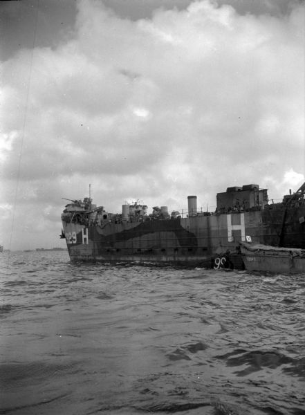 Tank Landing Ship 929 during an operation in Buckner Bay, Okinawa. Other ships are in the background.