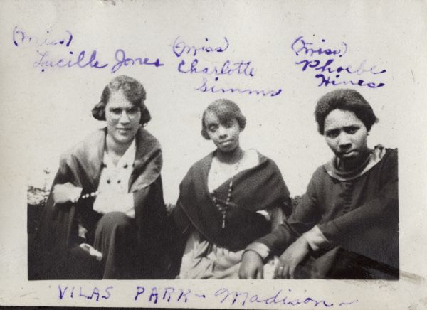 Three African American women, Lucille Jones, Charlotte Simms, and Phoebe Hines, posing in Vilas Park.