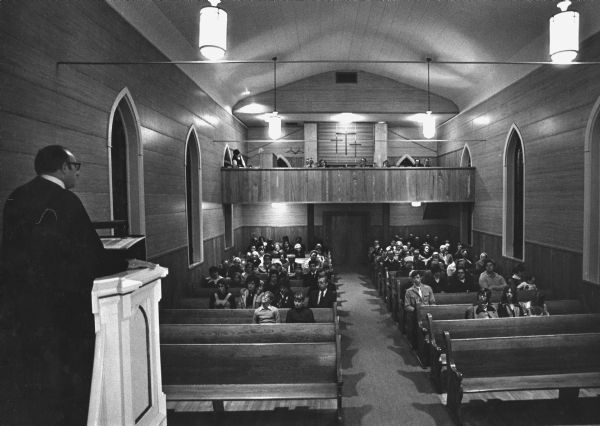 "St. Peter's Evangelical Lutheran Church. On the first day of Lent, Pastor Paul Kante preaches to his congregation."