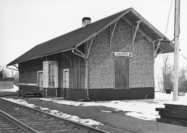 "Soo Line Railroad Station.  Before the days of radio, some of the local men would huddle around the telegraph key as reports came over the wire of a prize fight that took place in some distant city."