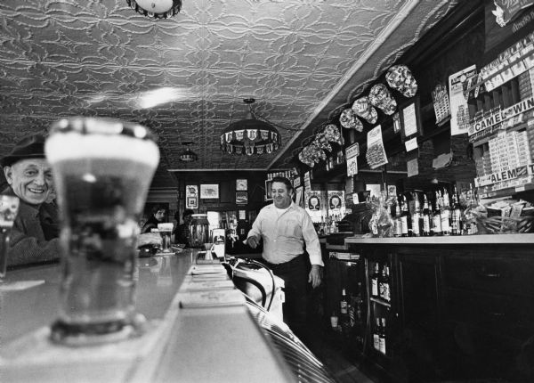 "Guelig's Corner Bar in downtown Theresa. Edgar 'Jr.' Guelig, proprietor."