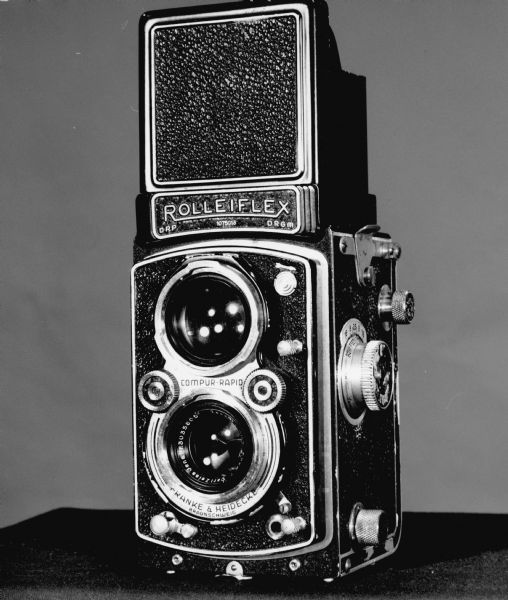"The vast majority of these pictures were taken with the above camera.  This twin-lens Automatic Rolleiflex was purchased in 1947. At that time this camera was very popular with "Life" magazine photographers, press photographers, and serious amateurs. The camera was manufactured in Germany & had a Zeiss Tessar f:3.5 lens. The top lens projected an image on a groundglass and viewed from above. The bottom lens was the taking lens. It took 12 2 1/4 x 2 1/4 pictures on a 120 roll."