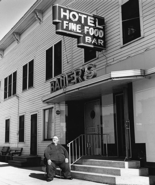 "'Mush' Bauer posed in front of Bauer's Restaurant in Campbellsport, WI."