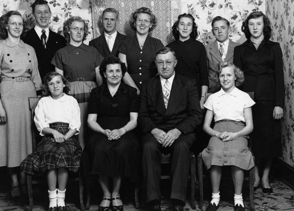"Elmer & Adela Giese Family.  Front: Bonnie, Adela, Elmer, & Shirley.  Back: Verona, Oscar, Ruth, Marvin, Margaret, Dorothy, Ralph, & Janet."