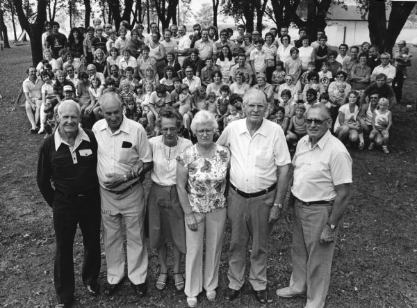 "Bodden family reunion.  From left; Herb, Oscar, Armella, Clara, Joe, and John Bodden, are parents of all these offspring."