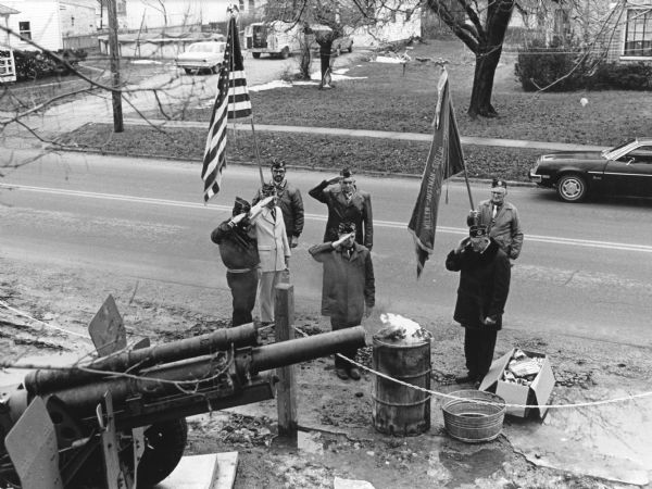 "Legion members performed a flag burning ceremony on Pearl Harbor Day.  Front; Comm. David Metz, Dodge County Comm. Jack Halverson, Gerald Beck & P. Bodden.  Back; Tony Geiger, Les Beck, and Willard Bogenschneider."