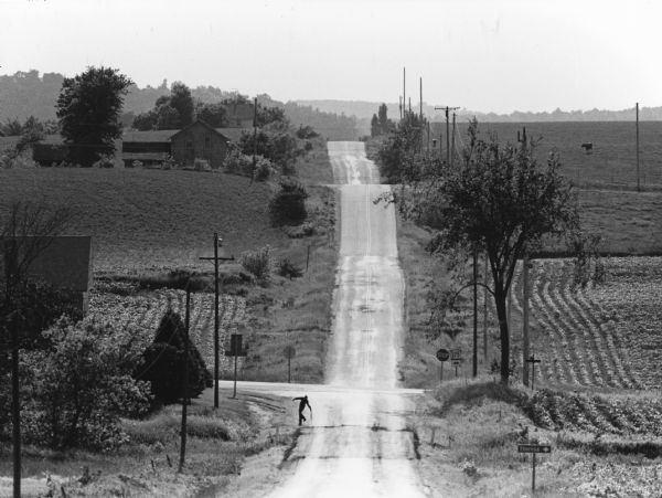 "In the foreground is the intersection of Hwy D & Hwy 175.  Beyond it is Allen Road."