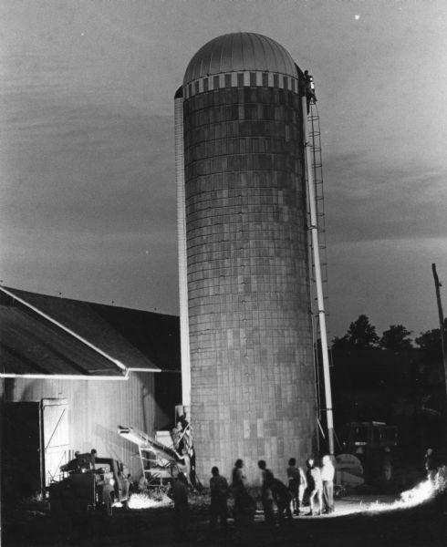 "Theresa firemen respond to a silo fire at the Henning farm on County P."
