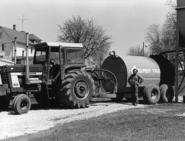 "Jerry Adelmeyer picks up whey at Widmer Cheese Factory and transports it to the slurry tank on his farm."