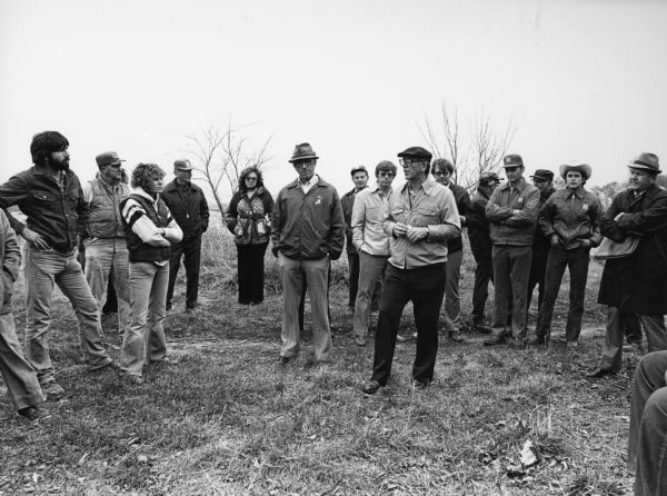 "Auctioneer, Norm Grantman, holds center stage on the Ziemer property south of Theresa on County P."