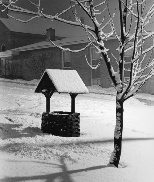 "The wishing well on the Philip and Marilyn Zingsheim property takes on a different aura with new fallen snow on a winter evening."