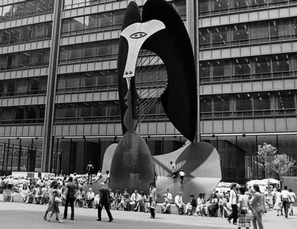 "This modern sculpture is in Chicago." The photograph features an untitled sculpture by Pablo Picasso, completed in 1967 and located in Daley Plaza.