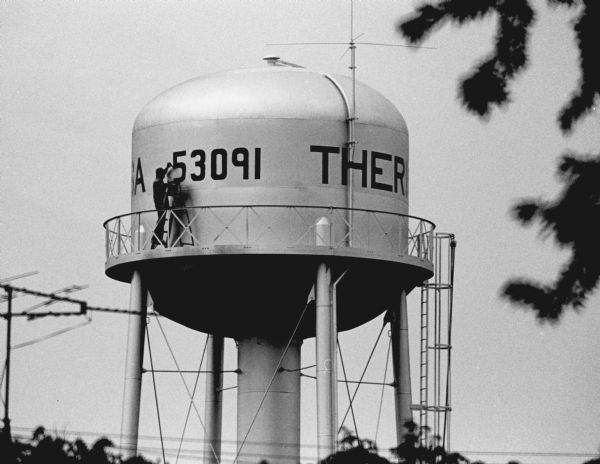 "Painting on Theresa's water tower."