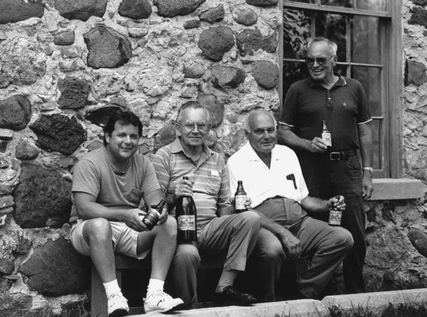 "Craig Ruffing, Les Beck, and Fred and Russ Bandlow relax at the old Weber Pioneer Beer Brewery."