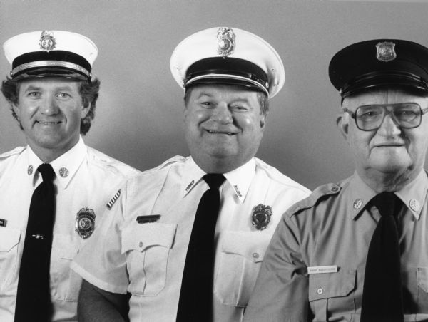"Harvey Bogenschneider (right), and his two sons, Dennis (center) and Robert (left) have dedicated 91 years of service to the Theresa, Hartland, and Butler County, Kansas, Fire Departments."