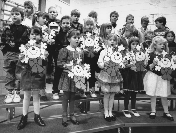 "Kindergarten children perform at a Christmas Party at the Theresa School."