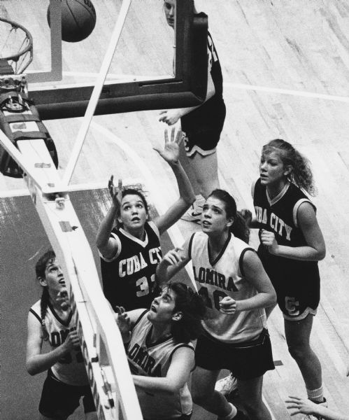 "Playing in the field house in Madison, it was a free-for-all under the Lomira basket as Lomira took on Cuba City."