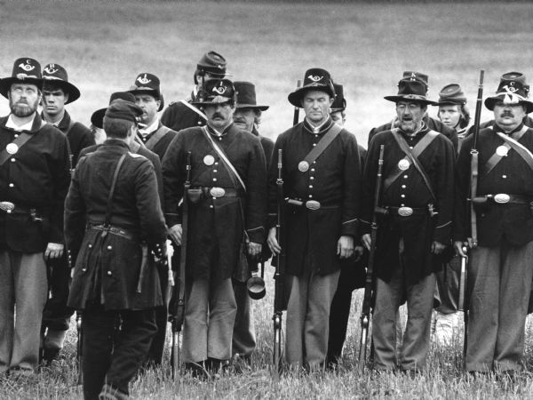 "Civil War reenactors stand at attention at Greenbush."