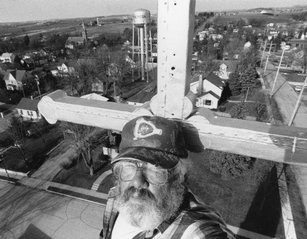 "Steeplejack, Tim McNitt, was asked to take some photos from the top of the steeple. This is the result obtained when he held a motorized camera with a 20mm lens at arm's length."